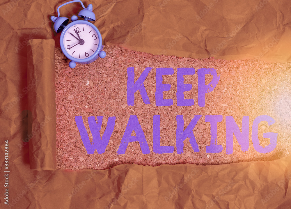 Poster handwriting text writing keep walking. conceptual photo continuing on exactly as we started aboundin