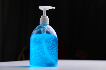 clean alcohol gel medical on black background