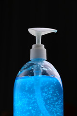 clean alcohol gel medical on black background
