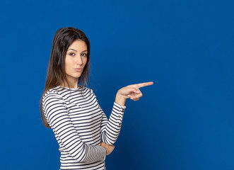 Brunette young woman wearing a striped T-shirt