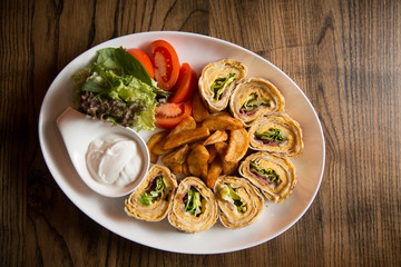 Omelette rolls on the table