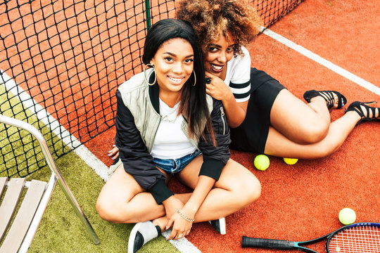 Young Pretty African Girlfriends Hanging On Tennis Court, Fashion Stylish Dressed Swag, Best Friends Happy Smiling Together