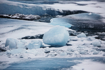 Iceland. Landscape of black beaches with icebergs