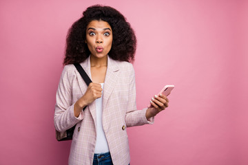 Photo of funny dark skin lady open mouth hold telephone read cool blog post comments walk lessons college backpack wear plaid blazer jeans isolated pastel color background