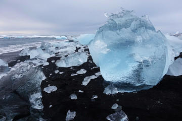 Iceland. Landscape of black beaches with icebergs