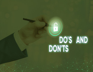 Word writing text Dos And Don tS. Business photo showcasing Rules or customs concerning some...
