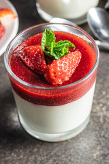 Italian dessert panna cotta with strawberries