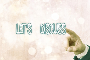 Writing note showing Lets Discuss. Business concept for asking someone to talk about something with...