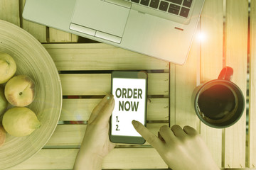 Conceptual hand writing showing Order Now. Concept meaning confirmed request by one party to...