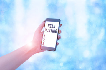 Word writing text Head Hunting. Business photo showcasing process of recruitment of a prospective...