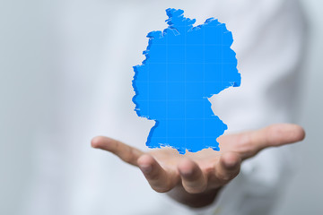 3D map of Germany. Map of Germany land border with flag. Germany map on white background. 3d rendering.