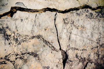 Rock texture with deep horizontal crack