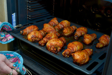 chicken legs wrapped in bacon