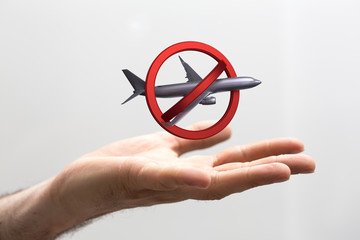 travel with plane prohibited warning sign .