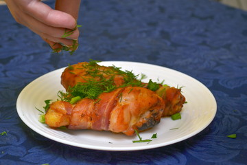 chicken legs wrapped in bacon