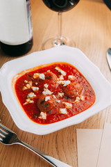 Serving dishes with mashed soup in the restaurant. Vegetable soup in a white plate.