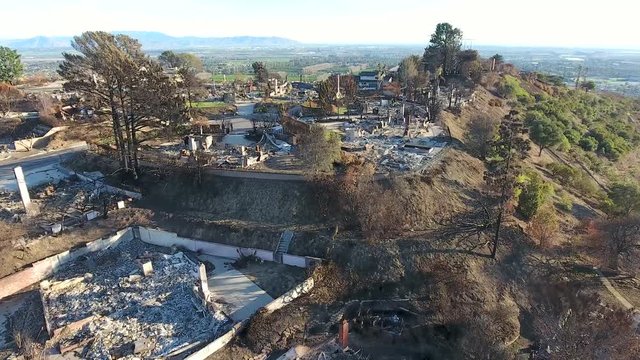 Burned homes after Thomas Fire in Ventura CA. Burned homes after Thomas Fire in Ventura CA southern forest blaze wildfire house ashes devastated post drone flying.