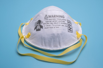 Closeup of N95 respirator. This respirator filter out at least 95% airborne particle including...