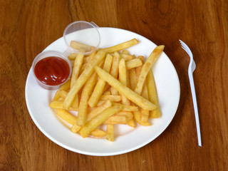 french fries with ketchup on plate