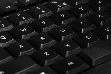 Black computer keyboard. People are now buying keyboards in order to be able to start teleworing or working remotely due to lock downs in many countries of the Covid-19 virrus