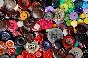 Background and texture of multicolored antique buttons