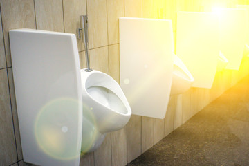 white male toilets are open in public places and look clean