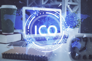 Multi exposure of blockchain and crypto economy theme hologram and table with computer background....