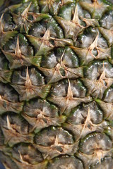 Fototapeta premium Pineapple whole fruit and leaves texture