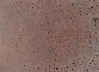 Red-colored abstract stone tile background