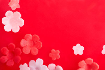 Background of red glaze and floral decorations