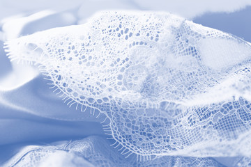 Pastel silk lace lingerie, blue gray color background