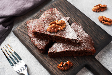 Homemade chocolate brownie with walnuts. Baking chocolate cake. copy space
