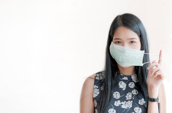 Young Woman Wearing Protective Mask Isolated On White Background.