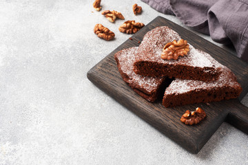 Homemade chocolate brownie with walnuts. Baking chocolate cake. copy space