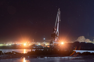 Night landscape of the port on the shore of Lake Onega in Karelia. Medvezhyegorsk. March 2020