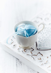 Easter Decoration. Bright wooden background. Close up.