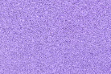 Decorative wall with purple cement.  Violet concrete wall texture for background and wallpaper.