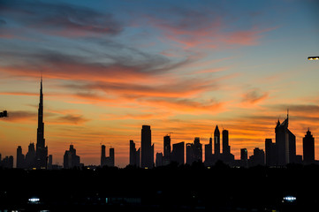 Fototapeta na wymiar Dubai skyline silhouette after sunset 