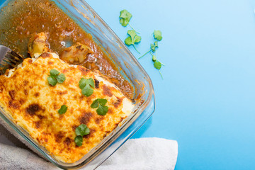 Traditional Greek dish Moussaka (Musaka).  Is an eggplant- or potato-based dish, often including ground meat