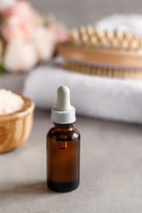 Brown dropper bottles on a blurry background. Beauty concept. Natural oils. Spa items.
