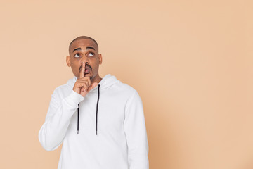 African guy with a white sweatshirt