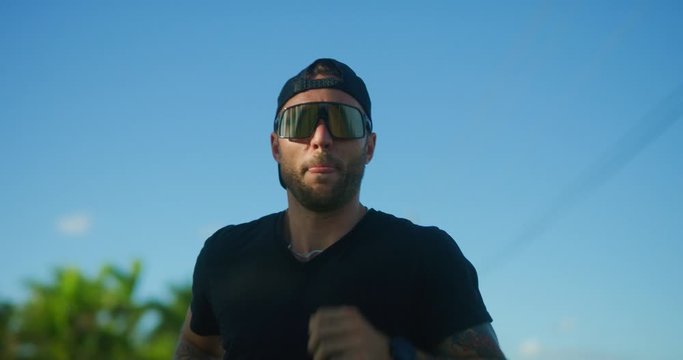 Male runner on rural road training