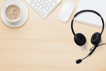 Office wooden backdrop with supplies and headset