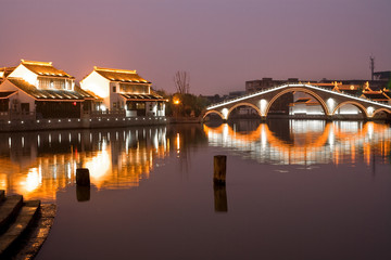 Illumiinated houses and canal at Suzhou, Jiangsu Province, China
