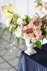 Bouquet of white and pink flowers in a vase. Decoration and decoration of the wedding table.