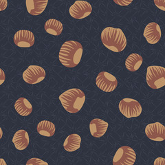 Tossed hazelnuts seamless vector pattern on dark background. Woodland food surface print design. For fabrics, stationery and packaging.