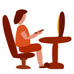 person sits in front of the TV with a remote control in hand