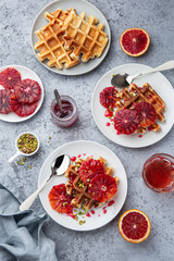 sweet waffles with red blood oranges and pistachios nuts