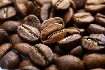 Coffee beans close-up background. Fresh roasted