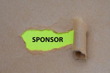 sponsor word written under torn paper Image.